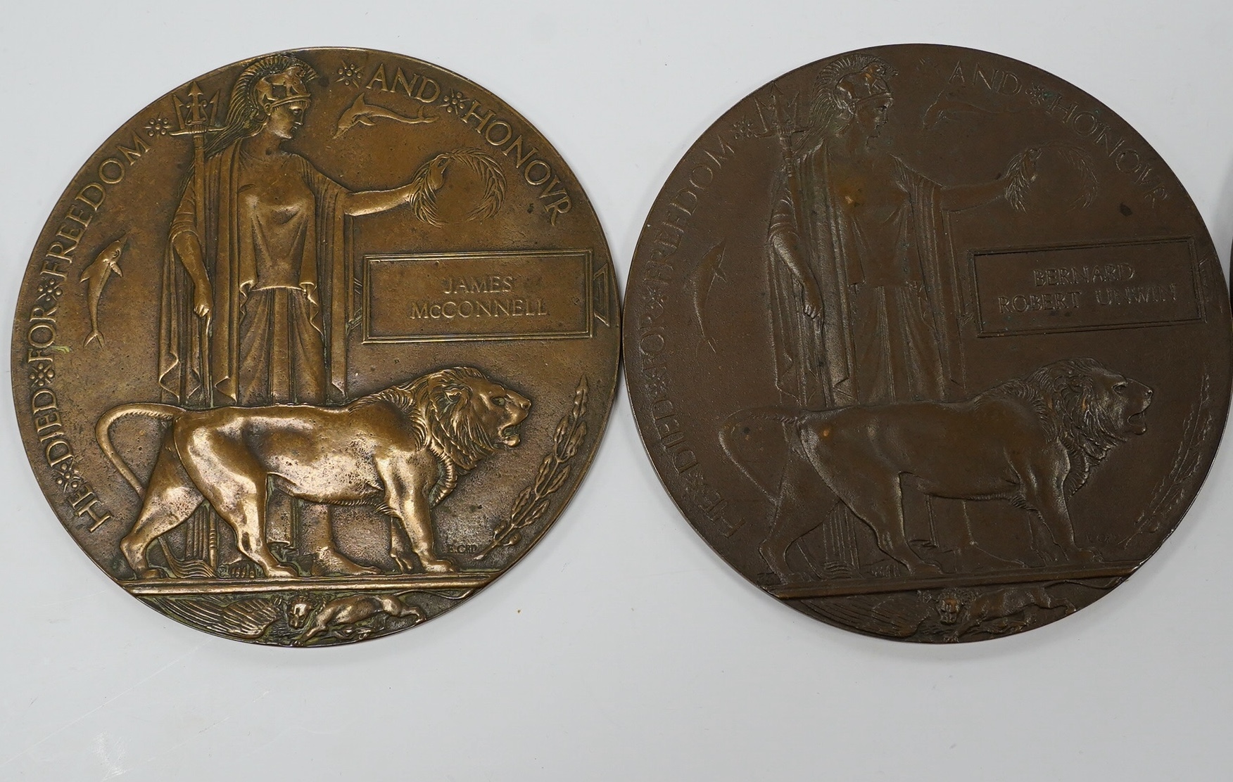 Five First World War Next of Kin Memorial plaques. Condition - fair to good